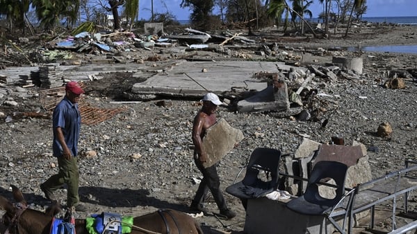 Residents recover their belongings after the passage of Hurricane Melissa in Boca de Dos Rios village, Santiago de Cuba province, Cuba Residents recover their belongings after the passage of Hurricane Melissa in Boca de Dos Rios village, Santiago de Cuba province, Cuba