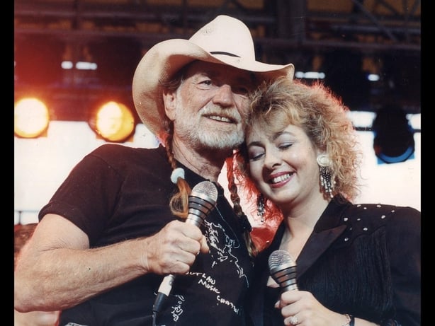 Irish country star Sandy Kelly pictured with willie nelson
