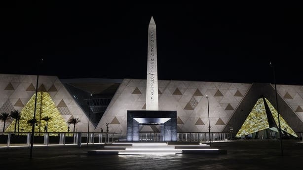The Obelisk of Ramses II is pictured before the facade and entrance of the new Grand Egyptian Museum