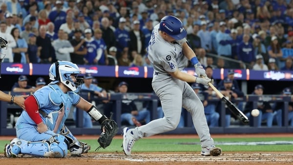 Toronto, Ontario, Friday, October 31, 2025 - Los Angeles Dodgers catcher Will Smith (16) hits a double to score Tommy Edman during the third inning of Game six of the 121st World Series between the LA Dodgers and the Toronto Blue Jays at Rogers Centre. (R