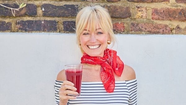 Chef Clodagh McKenna holding brightening juice