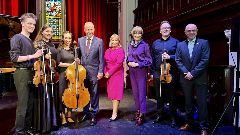 The Taoiseach pictured with staff and the Meliora Quartet at Triskel Arts Centre