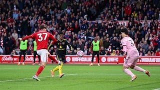 NOTTINGHAM, ENGLAND - NOVEMBER 01: Nicolo Savona of Nottingham Forest scores his team's first goal past Senne Lammens of Manchester United during the Premier League match between Nottingham Forest and Manchester United at City Ground on November 01, 2025