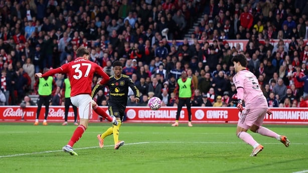 NOTTINGHAM, ENGLAND - NOVEMBER 01: Nicolo Savona of Nottingham Forest scores his team's first goal past Senne Lammens of Manchester United during the Premier League match between Nottingham Forest and Manchester United at City Ground on November 01, 2025 in Nottingham, England. (Photo by Molly Darli