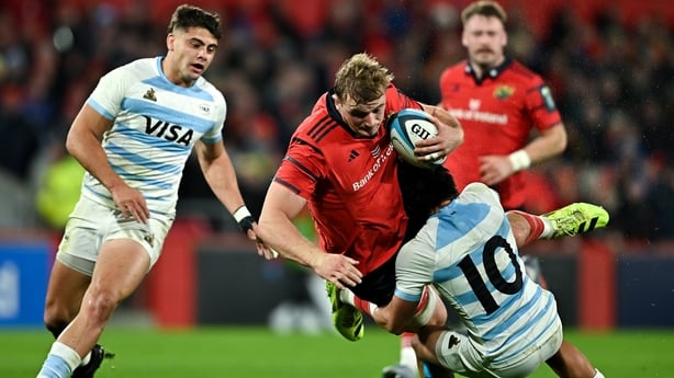 1 November 2025; Gavin Coombes of Munster is tackled by Julian Hernandez of Argentina XV during the tour match between Munster and Argentina XV at Thomond Park in Limerick. Photo by Sam Barnes/Sportsfile