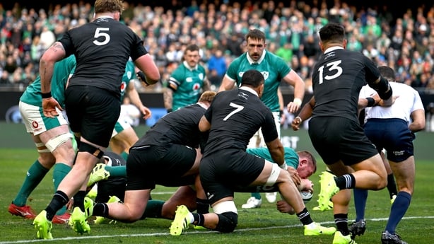 1 November 2025; Tadhg Furlong of Ireland, bottom, dives over to score his side's first try during the Gallagher Cup match between Ireland and New Zealand at Soldier Field in Chicago, USA. Photo by Ramsey Cardy/Sportsfile