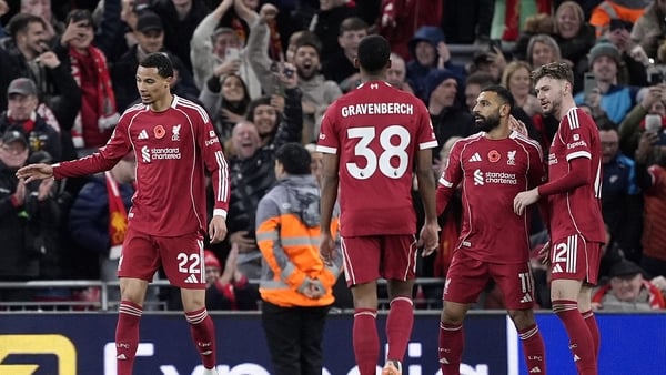 Liverpool's Mohamed Salah (second right) after scoring against Aston Villa - Premier League, November 2025
