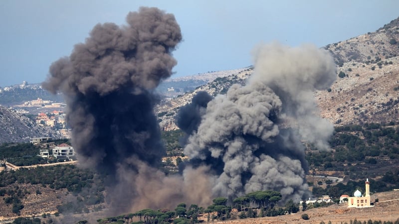 Smoke rises following an Israeli airstrike on the outskirts of the southern Lebanese village of Ej Jarmaq on 30 October