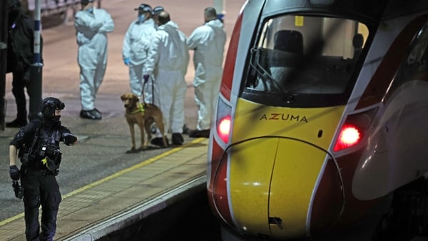 Police on the platform by the train at Huntingdon station in Cambridgeshire