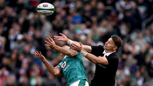 1 November 2025; James Lowe of Ireland in action against Beauden Barrett of New Zealand during the Gallagher Cup match between Ireland and New Zealand at Soldier Field in Chicago, USA. Photo by Ramsey Cardy/Sportsfile