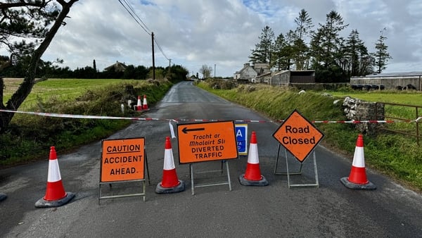 Bollards and signs block a rural road in Galway where a crash took place