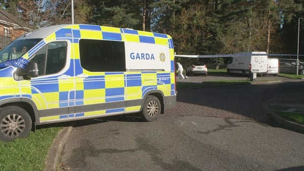 garda and forensic teams and scene of a fatal assault in Dublin