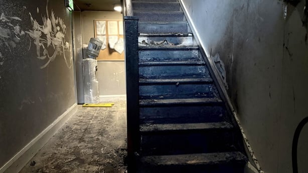 Stairs badly damaged by a fire set at an IPAS centre