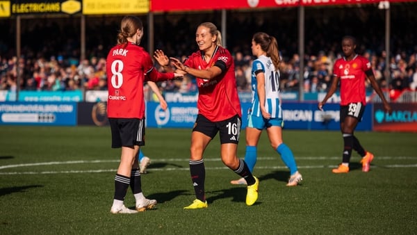 Lisa Naalsund of Manchester United celebrates scoring her teams third goal with teammate Jess Park during the Barclays Women's Super League match between Brighton & Hove Albion and Manchester United at Broadfield Stadium on November 02, 2025 in Crawley, E