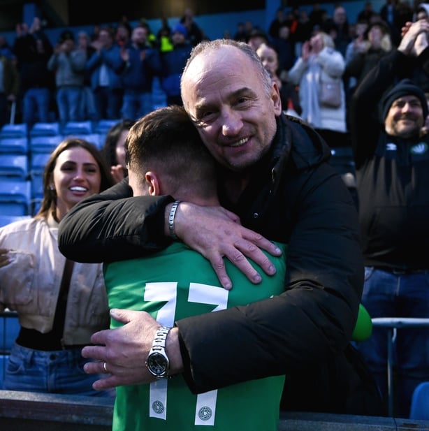 Winning goalscorer Justin Ferizaj of Bray Wanderers celebrates with his father Altin Ferizaj after scoring winning goal against Treaty United in 2025 First Division play-off final