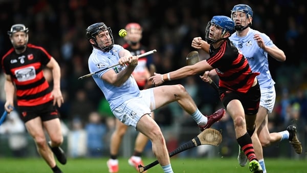 2 November 2025; Peter Casey of Na Piarsaigh scores a point despite the attention of Paddy Leavy of Ballygunner during the AIB Munster GAA Hurling Senior Club Championship quarter-final match between Na Piarsaigh of Limerick and Ballygunner of Waterford a