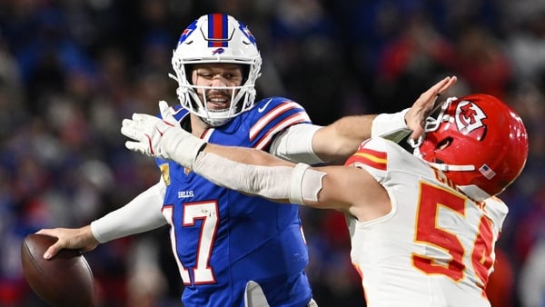 Josh Allen of the Buffalo Bills blocks Leo Chenal of the Kansas City Chiefs