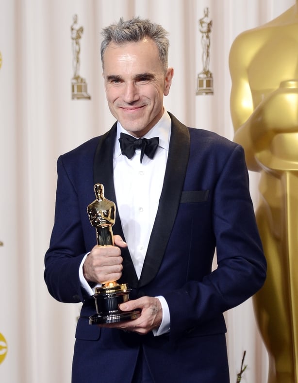 Daniel Day-Lewis pictured with his Best Actor Oscar for Lincoln in 2013