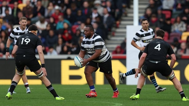 BRENTFORD, ENGLAND - NOVEMBER 01: Asenathi Ntlabakanye of Barbarians runs with the ball during the Barbarians v All Blacks XV match at Gtech Community Stadium on November 01, 2025 in Brentford, England. (Photo by Steve Bardens/Getty Images for Barbarians)