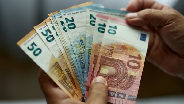 Close up of unrecognizable man counting euros.