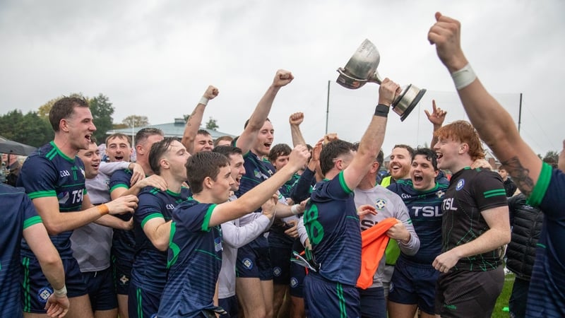 Team captain Nathan McElwaine holds the London title aloft after North London Shamrocks defeated Tír Chonaill Gaels. Photo: North London Shamrocks
