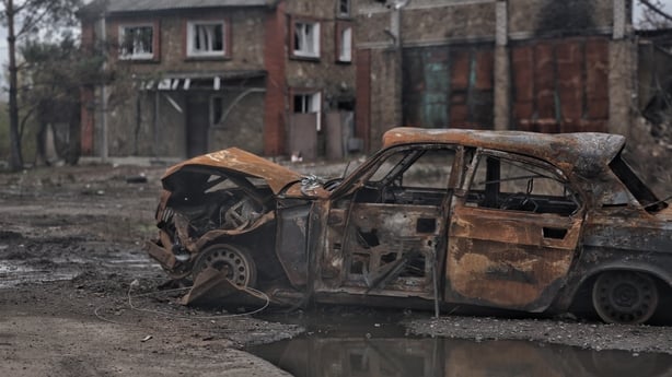 A destroyed car remains on the road after Russian attacks on the city on November 1, 2025 in Kostiantynivka, Donetsk