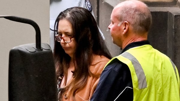 Convicted killer Erin Patterson (L) leaves the Supreme Court of Victoria in Melbourne