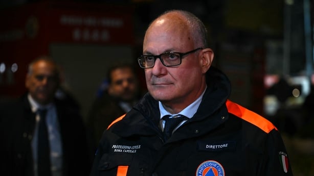 A man speaks to the press