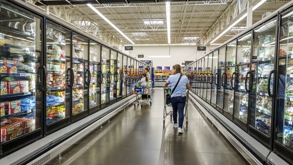 People shop in a supermarket