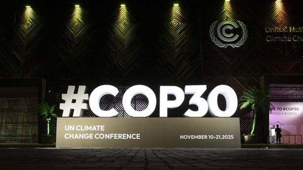 Partial view of one of the entrances at the City Park of COP30 showing a sign for the conference