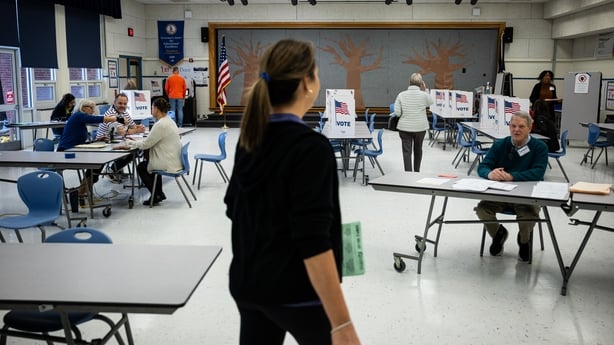 Voters cast their ballots at a polling station at Chesterbrook Elementary School in McLean, Virginia, US