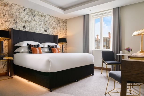 A photo of a bedroom suite at The Dylan Hotel