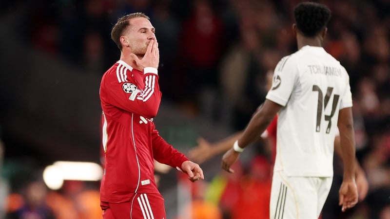 Alexis Mac Allister blows a kiss to the Anfield crowd after his goal