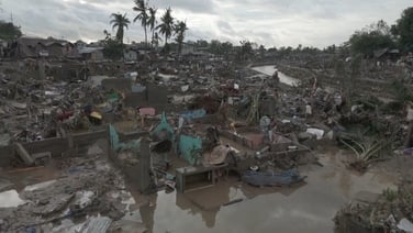 Drone footage shows flooded streets and submerged buildings after typhoon hits Philippines