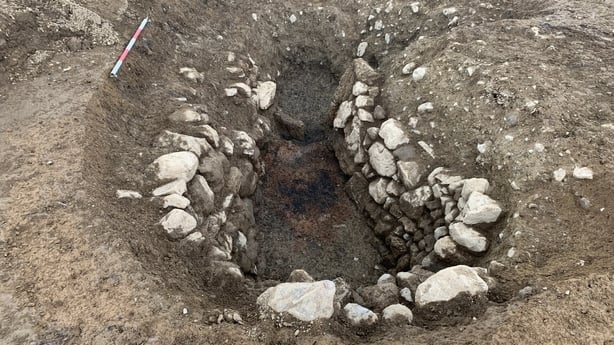 A stone line pit on an archaeological site 