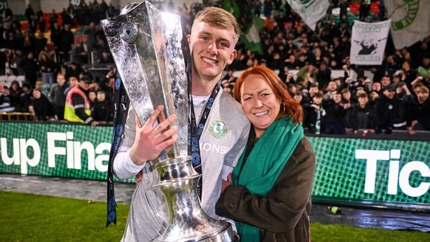 Michael Noonan of Shamrock Rovers and his mother Sandie celebrate with the SSE Airtricity Men's Premier Division trophy after the SSE Airtricity Men's Premier Division match between Shamrock Rovers and Sligo Rovers at Tallaght Stadium in Dublin.