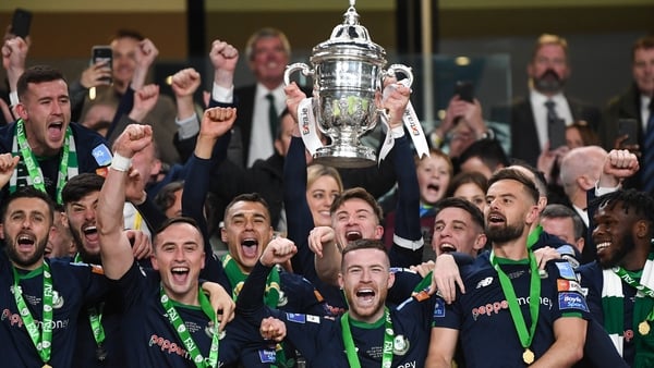 Shamrock Rovers captain Ronan Finn and team-mates celebrate with the FAI Cup in 2019