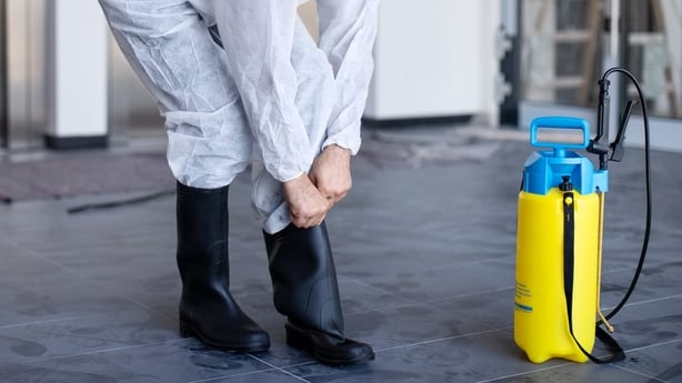 Man getting ready with protective workwear 
