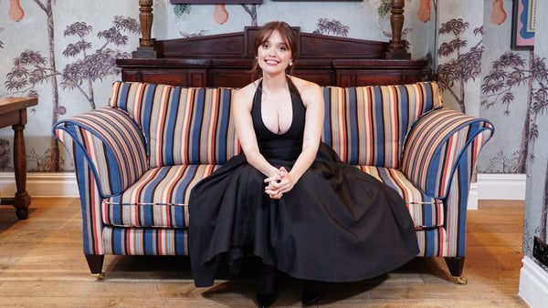 Aimee Lou Wood pictured on a couch at a screening in London
