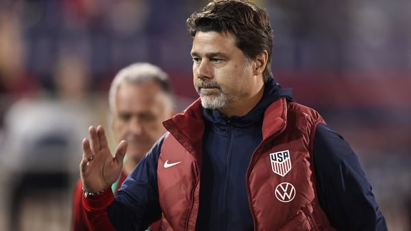 COMMERCE CITY, COLORADO - OCTOBER 14: Head coach of the United States Mauricio Pochettino enters the field and greets the fans during an international friendly match between the United States and Australia at Dick's Sporting Goods Park on October 14, 2025