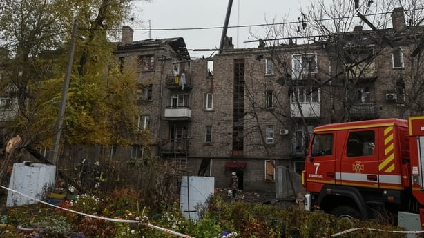 Emergency services at the scene of a Russian drone strike in Kamianske, Dnipro region, Ukraine, today 