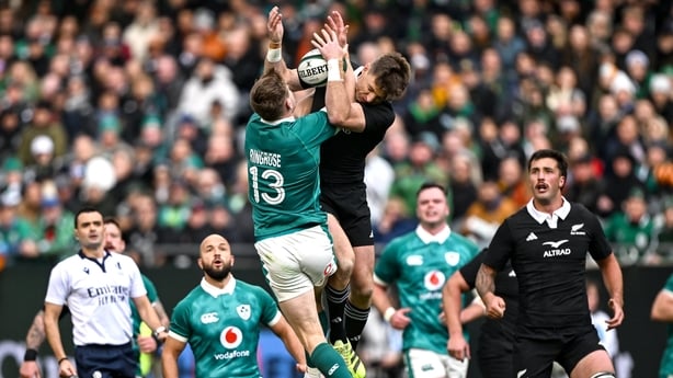 1 November 2025; Garry Ringrose of Ireland in action against Beauden Barrett of New Zealand during the Gallagher Cup match between Ireland and New Zealand at Soldier Field in Chicago, USA. Photo by Ramsey Cardy/Sportsfile