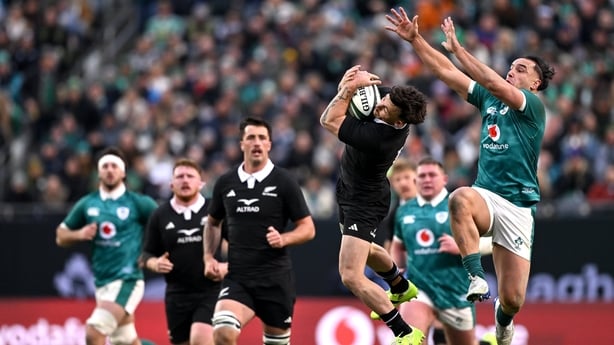 1 November 2025; Leroy Carter of New Zealand in action against James Lowe of Ireland during the Gallagher Cup match between Ireland and New Zealand at Soldier Field in Chicago, USA. Photo by Ramsey Cardy/Sportsfile