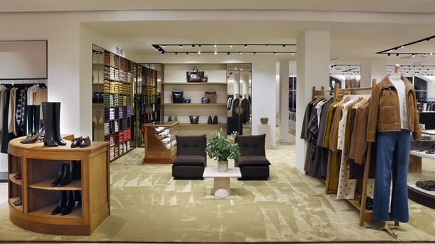 A photo of the Sezane pop-up in Brown Thomas, Dublin showing mannequins and racks of clothes