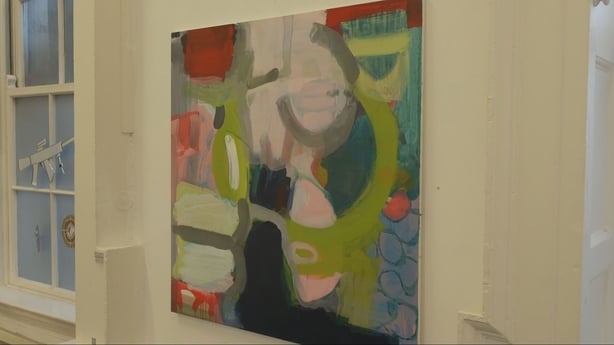 A painting hangs on a wall in a Dublin Art Gallery
