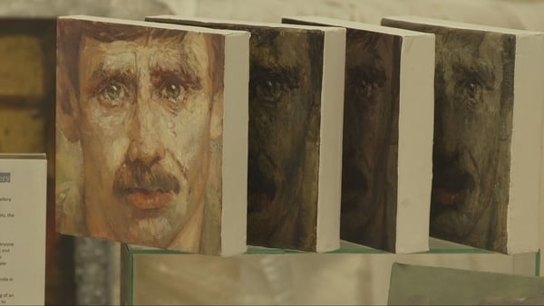 A painting hangs on a wall in a Dublin Art Gallery