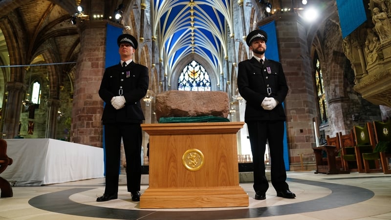 Police officers guard the Stone of Destiny ahead of an event held in Scotland in 2023