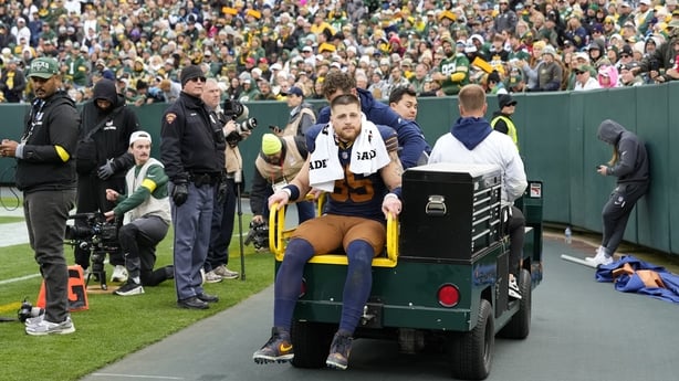 Tucker Kraft #85 of the Green Bay Packers is helped off the field with an injury in the third quarter against the Carolina Panthers in the game at Lambeau Field on November 02, 2025 in Green Bay, Wisconsin. (Photo by John Fisher/Getty Images)