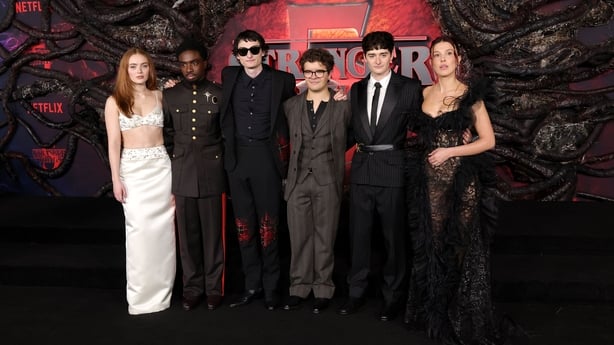 HOLLYWOOD, CALIFORNIA - NOVEMBER 06: (L-R) Sadie Sink, Caleb McLaughlin, Finn Wolfhard, Gaten Matarazzo, Noah Schnapp and Millie Bobby Brown attend the Los Angeles Premiere of Netflix's "Stranger Things" Season 5 at TCL Chinese 6 Theatres on November 06, 2025 in Hollywood, California. (Photo by Kevi