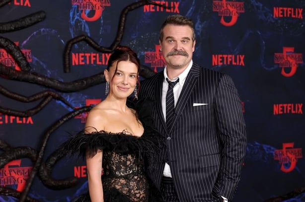 HOLLYWOOD, CALIFORNIA - NOVEMBER 06: (L-R) Millie Bobby Brown and David Harbour attend the Los Angeles Premiere of Netflix's "Stranger Things" Season 5 at TCL Chinese 6 Theatres on November 06, 2025 in Hollywood, California. (Photo by Kevin Winter/Getty Images)
